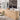 sienna peel & stick wood planks in coffee shop around counter